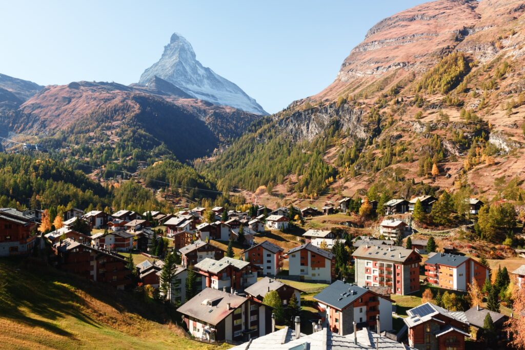 Picturesque autumn view of Zermatt city street with Matterhorn peak